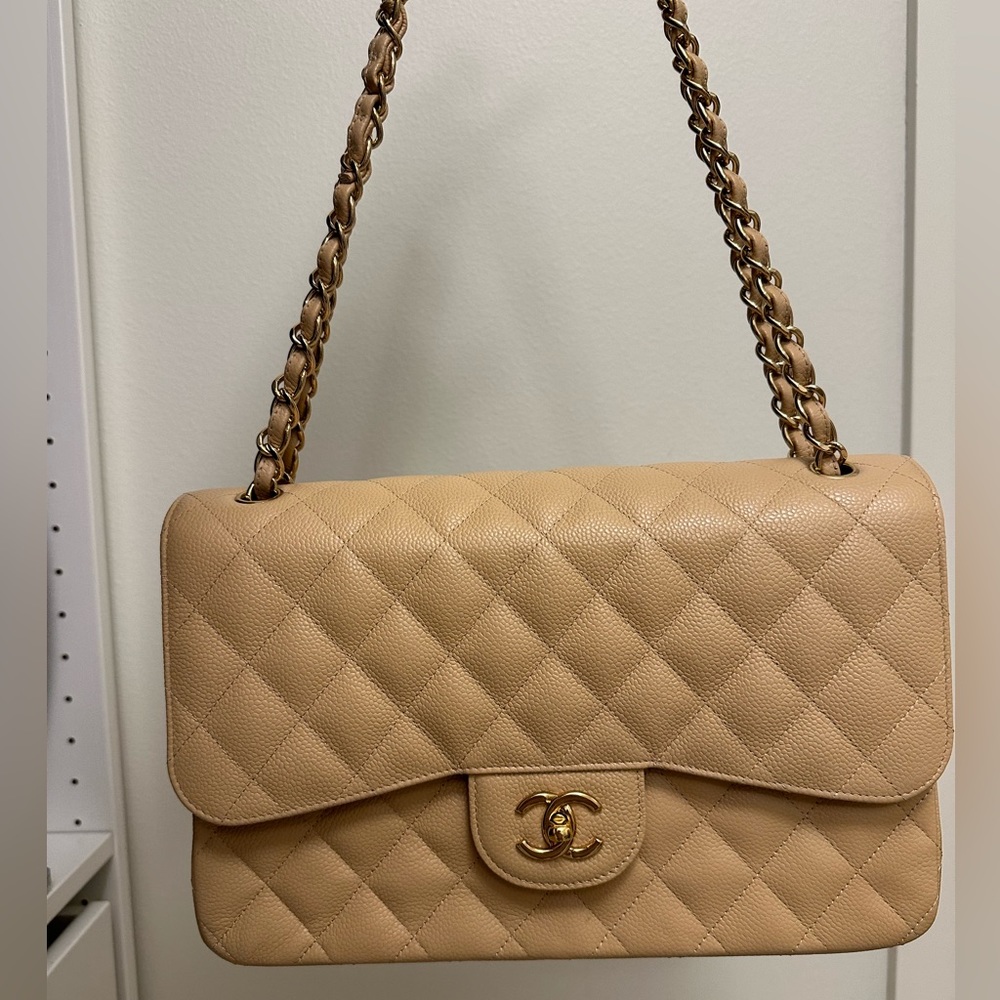 Never worn Chanel Jumbo Classic in nude w/ gold hardware. Sell for $11,0…